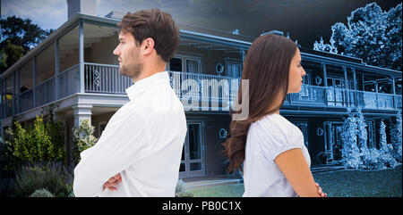 Composite image of upset couple not talking to each other after fight Stock Photo