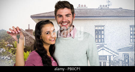 Composite image of cheerful couple holding keys Stock Photo