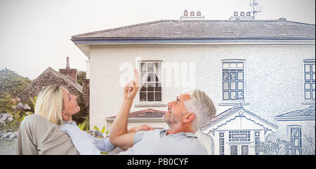 Composite image of couple leaning on each other while lying on floor Stock Photo