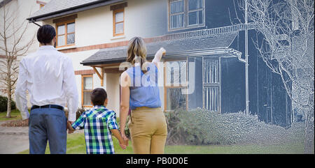 Composite image of family holding hands while standing Stock Photo