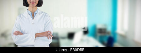 Composite image of doctor standing with arms crossed against white background Stock Photo