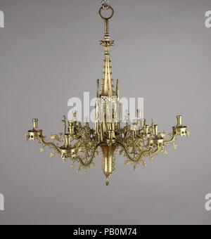 Chandelier with tabernacle (Kapellenkrone). Artist: German, cast in F. Ring Foundry , Munich. Culture: German, Munich. Dimensions: H. 106 cm, L. of long branches 41 cm, L. of short branches 19 cm. Date: ca. 1875 after a dinanderie model from the Southern Netherlands, ca. 1450. Museum: Metropolitan Museum of Art, New York, USA. Stock Photo