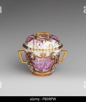 Two-handled cup with cover. Culture: German, Meissen. Decorator: Decoration attributed to Ignaz Bottengruber (active ca. 1720-ca. 1730, Breslau, ca. 1728-30). Dimensions: Height: 4 3/4 in. (12.1 cm). Factory: Meissen Manufactory (German, 1710-present). Date: 1725-30. Museum: Metropolitan Museum of Art, New York, USA. Stock Photo