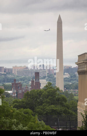 Rainy day view from the Library of Congress shows edge of the U.S. Capitol at right, Washington Monument, Smithsonian Castle, and Lincoln Memorial, wi Stock Photo