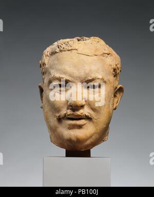 Honoré de Balzac. Artist: Auguste Rodin (French, Paris 1840-1917 Meudon). Culture: French. Dimensions: Height (wt. on block, confirmed): 9 1/4 in., 14.4 lb. (23.5 cm, 6.6 kg). Date: ca. 1891.  In conceiving of Balzac's monument, Rodin refused to execute a superficially accurate likeness based on photographs of the deceased writer. Instead, he traveled to Balzac's native Touraine province in order to be inspired by men who resembled him. A burly local named Etrager sat for the portrait. In this terracotta sketch, Etrager's hefty features, furrowed brow, and penetrating expression echo Balzac's. Stock Photo