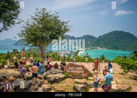 Tourists enjoy panoramic view over Koh Phi Phi Island in Thailand Stock Photo