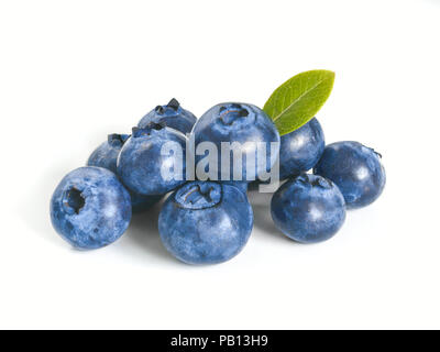 Blueberries isolated on white background. Extreme close up view of heap blueberry berries with green leaf. Isolated on white with clipping path. Stock Photo