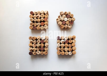Wine corks square and circle shapes isolated on white background from a high angle view Stock Photo
