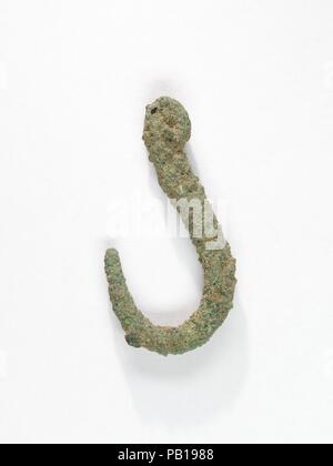 Fish hook. Dimensions: L. 2.7 (1 1/16 in.) W. 1.4 cm ( 9/16 in.). Dynasty: Dynasty 19-20. Date: ca. 1295-1070 B.C.. Museum: Metropolitan Museum of Art, New York, USA. Stock Photo