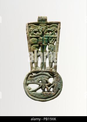Faience amulet. Culture: Egyptian. Dimensions: H.: 3 3/16 in. (8.1 cm). Date: ca. 1090-900 B.C..  Symbolic objects used for amulets include a menat-pendant, the djed-sign, and a papyrus capital, all common in Egyptian architecture.  A pectoral used on mummies, a bunch of grapes or other clusters of fruit, and an inscribed bead are also represented. Museum: Metropolitan Museum of Art, New York, USA. Stock Photo