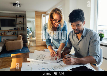 Architect colleagues working in office Stock Photo