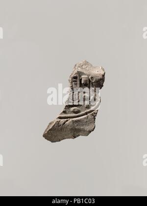 Fragmentary Seal Impression from Tutankhamun's Embalming Cache. Dimensions: L. 3 cm (1 3/16 in.); W. 2 cm (13/16 in.). Dynasty: Dynasty 18. Reign: reign of Tutankhamun. Date: ca. 1336-1327 B.C..  This mud sealing has the impression of a seal with the name of Tutankhamun and the epithet 'beloved of Ptah.'. Museum: Metropolitan Museum of Art, New York, USA. Stock Photo