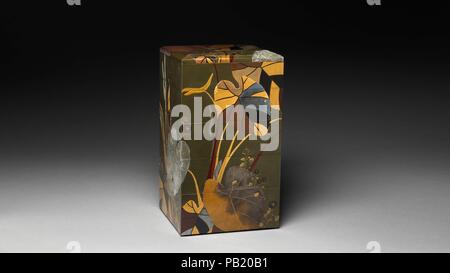 Stacked Food Box (Jubako) with Taro Plants and Chrysanthemums. Artist: Shibata Zeshin (Japanese, 1807-1891). Culture: Japan. Dimensions: H. 16 1/2 in. (41.9 cm); W. 9 in. (22.9 cm); D. 9 5/8 in. (24.4 cm). Date: mid-19th century.  This food box was designed for a celebratory meal, such as New Year's feast. It comes with two lids so that the boxes can be easily separated into two sets. The decorative, modern design consists of taro plants (satoimo) and chrysanthemum flowers.   Shibata Zeshin was renowned for both his lacquer works and paintings. Because he started his career in the Edo period a Stock Photo