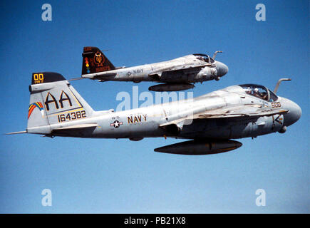 A-6Es CAG 1996. Two A-6E Intruder aircrafts, one from the 'Sunday Punchers' of Medium Attack Squadron Seven Five (VA 75) (bottom), and the other from the 'Main Battery' of Medium Attack Squadron One Nine Six (VA 196) (top), patrol the skies over the Persian Gulf in support of Operation SOUTHERN WATCH. Stock Photo