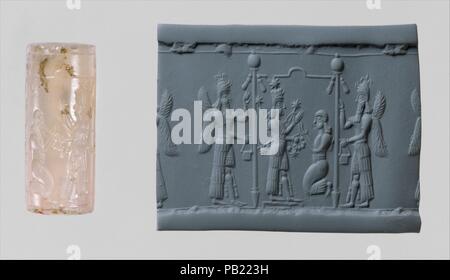 Cylinder seal and modern impression: Ishtar image and a worshiper below a canopy flanked by winged genies. Culture: Assyrian. Dimensions: H. 1 1/4 in. (3.1 cm). Date: ca. 8th-7th century B.C..  Seals of the early first millennium B.C. in Babylonia and Assyria were carved in the linear, drilled, cut, and modeled styles. The modeled style illustrated here derives from earlier Middle Assyrian seal carving and from the modeled sculpture in the palace of Sargon II (r. 721-705 B.C.), king of Assyria at Khorsabad. This style was used predominantly on seals showing scenes of contest and worship.  On t Stock Photo