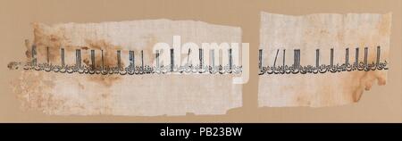 Tiraz Textile Fragment. Dimensions: Textile: H. 4 5/8 in. (11.7 cm)  W. 11 in. (27.9 cm)  Mount: H. 8 3/8 in. (21.3 cm)  W. 21 3/8 in. (54.3 cm)  D. 1 1/8 in. (2.9 cm). Date: ca. 991-1031.  This rectangular textile fragment of white linen is embroidered with an Arabic inscription in kufic script, which reads: 'Bismillah. Praise be to God, the Lord of the worlds, and a good end to those who fear God. And God bless Muhammad the seal of the Prophets, and all his family, the good, the excellent. Blessing from God and glory to the Caliph, the servant of God, Abu'l-?Abbas Ahmad, al-Qadir billah, Com Stock Photo