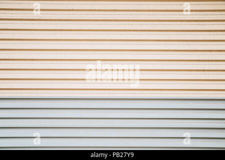 Beige and gray color shutter door background Stock Photo