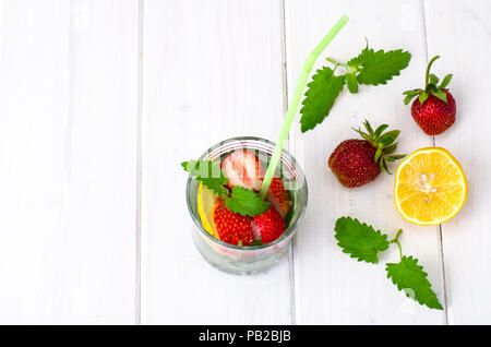Fruity drink refreshing on white wooden table Stock Photo