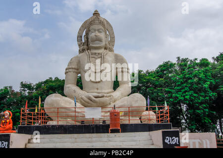 Hindu God Hanuman idol, Huge Statue of Indian lord Hanuman.  Indian God Hanuman Huge Statue Background Stock Photo