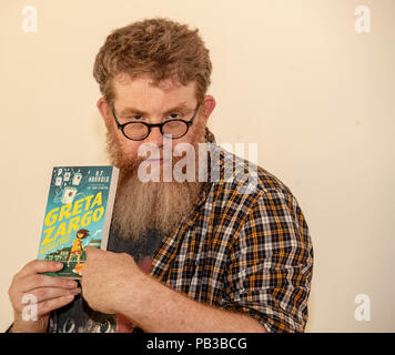 Brentwood, Essex, UK. 26th July 2018 Brentwood Children’s literary festival presented a workshop by A F Harrold, poet, writer and performance artist.  Author of Greta Zargo and the Death Robots from Outer Space and Greta Zargo and the Amoeba Monsters from the Middle of the Earth.  Credit Ian Davidson/Alamy Live News Stock Photo
