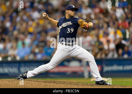 Milwaukee, WI, USA. 24th July, 2018. Milwaukee Brewers starting pitcher Corbin Burnes #39 delivers a pitch during the Major League Baseball game between the Milwaukee Brewers and the Washington Nationals at Miller Park in Milwaukee, WI. John Fisher/CSM/Alamy Live News Stock Photo