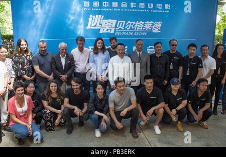 Belgrade, Serbia. 26th July, 2018. Guests pose for a group photo at a ceremony marking the start of filming of 'Belgrade Escape' in Belgrade, Serbia, on July 26, 2018. Filming of 'Belgrade Escape' started here on Thursday, marking the first co-production movie between Serbia and China. Credit: Nemanja Cabric/Xinhua/Alamy Live News Stock Photo