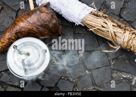 Handmade Umbanda tools and objects made with nature materials in the street. Wallpaper background of ethnic religion and faith. No people. Stock Photo