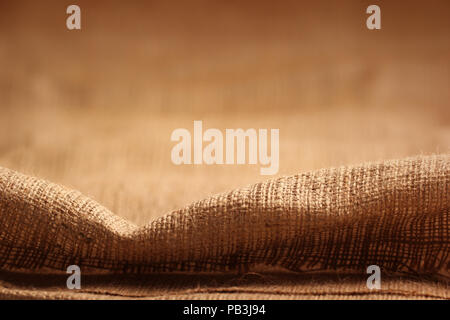 Natural linen texture on wooden. Stock Photo