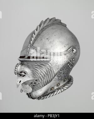 Armet with Mask Visor in Form of a Rooster. Culture: German, probably Augsburg. Dimensions: H. 10 3/16 in. (25.9 cm); W. 9 in. (22.9 cm); D. 14 3/8 in. (36.5 cm); Wt. 6 lb. 6 oz. (2892 g). Date: ca. 1530.  This helmet is remarkable for the three-dimensional figure of a rooster's head in the center of the visor, which is an outstanding example of sculpture in steel and is unprecedented even among mask visors. Museum: Metropolitan Museum of Art, New York, USA. Stock Photo