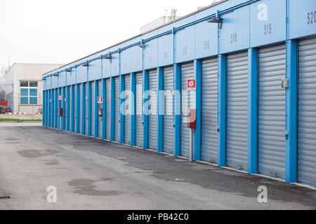 Numbered self storage and mini storage garage units Stock Photo