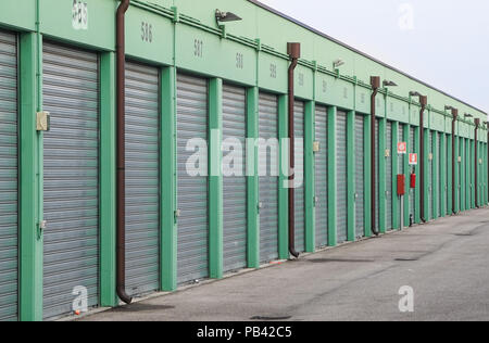 Numbered self storage and mini storage garage units Stock Photo