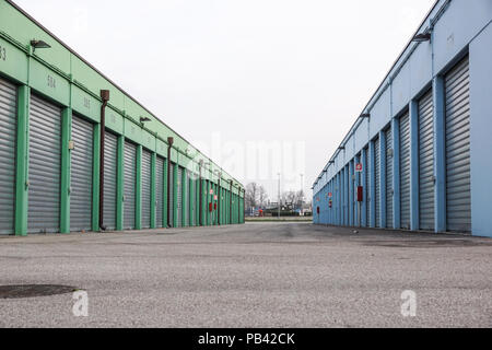 Numbered self storage and mini storage garage units Stock Photo