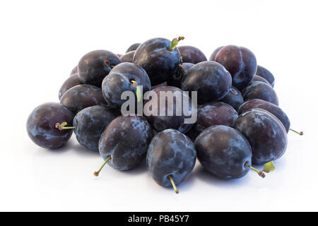 Ripe Plums Isolated on White. Stock Photo