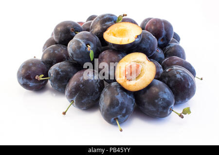 Ripe Plums Isolated on White. Stock Photo