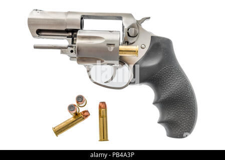 A 357 magnum revolver with ammunition and one in the chamber on an isolated background Stock Photo