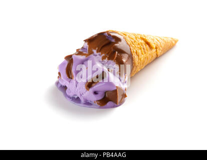 mini sweet potato flavor ice cream cone in a melting process on blue background Stock Photo