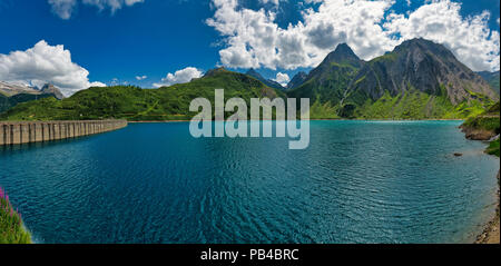 Landscape on the lake of Morasco in summer season with blue sky and clouds in background, Formazza valley - Piedmont, Italy Stock Photo