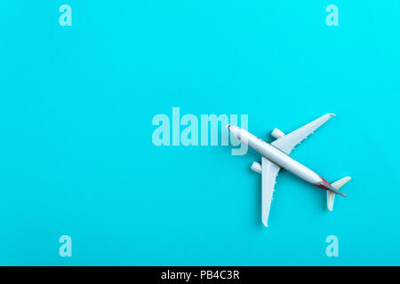 Model plane,airplane on blue pastel color background. Stock Photo