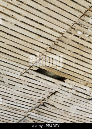 Old plaster and lath ceiling in need of repair Stock Photo