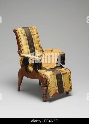 Patent model for adjustable reclining chairs. Culture: American. Dimensions: 10 x 6 x 7 in. (25.4 x 15.2 x 17.8 cm). Maker: George A. Schastey (1839-1894). Date: 1873.  George A. Schastey (1839-1894) headed one of the principal cabinetmaking and decorating firms of America's Gilded Age. Born in Merseburg, Germany, he immigrated to New York as a young boy in 1849. After fighting for the Union in the Civil War, Schastey took up work in New York's expanding furniture trade with several of the city's leading cabinetmakers and decorators before opening his own business in 1873.  The late nineteenth Stock Photo