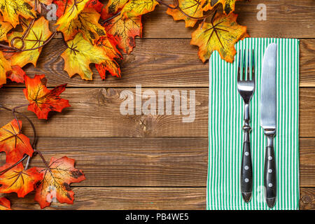 Wooden background with fork, knife Stock Photo