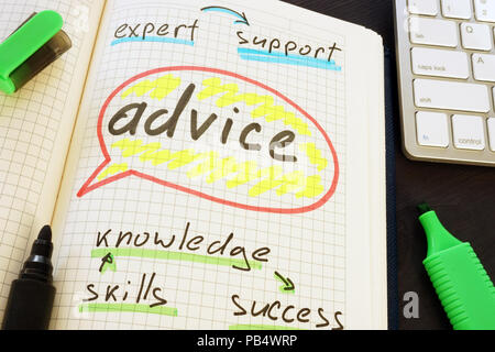 Advice handwritten in the notepad. Mentoring concept. Stock Photo