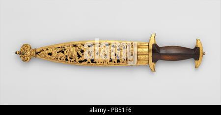 Swiss Dagger with Sheath, Bodkin, and By-Knife. Culture: Swiss. Dimensions: Dagger (04.3.130); L. with sheath 17 5/8 in. (44.8 cm); L. without sheath 15 3/4 in. (40 cm); W. 3 1/2 in. (8.9 cm); Wt. 1 lb. 1.5 oz. (496.1 g); Wt. of sheath 13.3 oz. (377 g); bodkin (04.3.131); L. 7 1/16 in. (17.9 cm); Wt. 0.8 oz. (22.7 g); knife (04.3.132); L. 8 1/16 in. (20.5 cm); W. 5/8 in. (1.6 cm); Wt. 1.1 oz. (31.2 g). Date: ca. 1570.  Daggers with I-shaped grips were known as baselards, after the city of Basel, and were considered a national arm of the Swiss. Splendidly decorated specimens such as this one, w Stock Photo