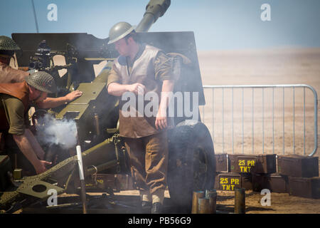 Anti-aircraft flak cannon being prepped and fired by British Military personnel taking part in the 2018 Southport Airshow Stock Photo