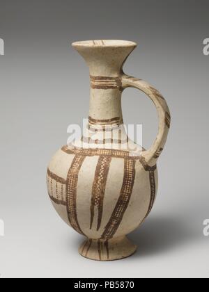 Terracotta jug. Culture: Cypriot. Dimensions: H. 7 5/8 in. (19.4 cm). Date: ca. 1600-1200 B.C..  White slipware with handle and funnel-shaped lip. Museum: Metropolitan Museum of Art, New York, USA. Stock Photo