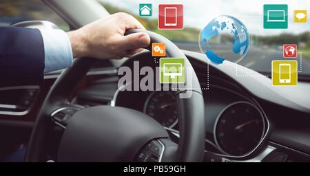 Man driving in car with heads up display interface Stock Photo