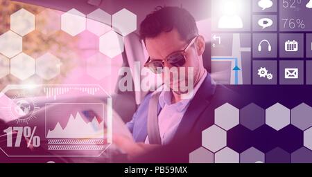 Man in driverless autonomous car with heads up display interface Stock Photo