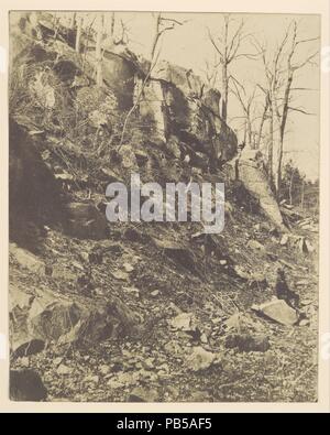 [Rocky Hillside]. Artist: Victor Prevost (French, 1820-1881). Dimensions: Image: 12 5/16 × 9 13/16 in. (31.2 × 24.9 cm). Date: 1850s.  Born in France, Victor Prevost emigrated to America in 1848 and remains one of the country's most enigmatic early photographers using the paper negative process. Prevost had learned his technique directly from Gustave Le Gray, the leading French photographer of the day, and used it with great success to photograph the evolving shape of New York City beginning in 1853. His views of the ever-changing facades of businesses on Broadway, the city's most active comme Stock Photo