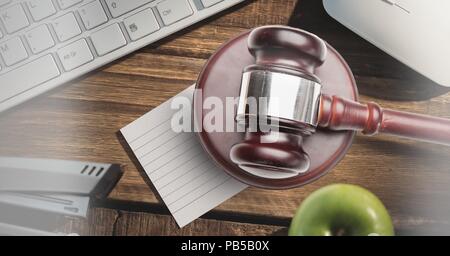 Gavel and keyboard on desk