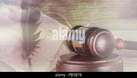 Gavel and feather pen transition Stock Photo